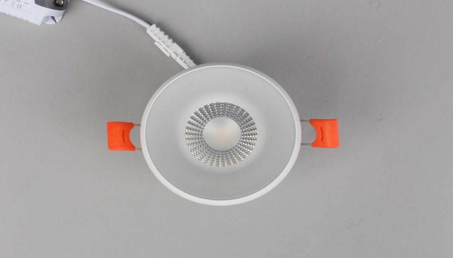 Change a spotlight bulb with a spring clip