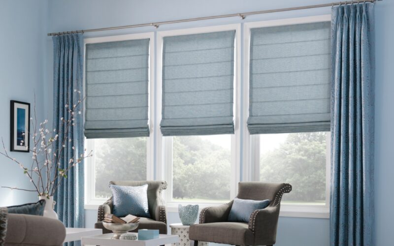 Wave curtains with roman blinds