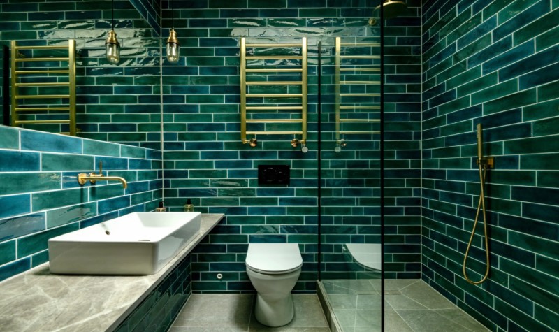 Incorporate Some Metallic Touches - dark green bathroom